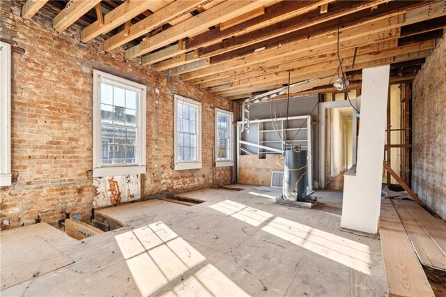 1432 Magazine St, New Orleans, LA 70130 - miscellaneous room with brick wall