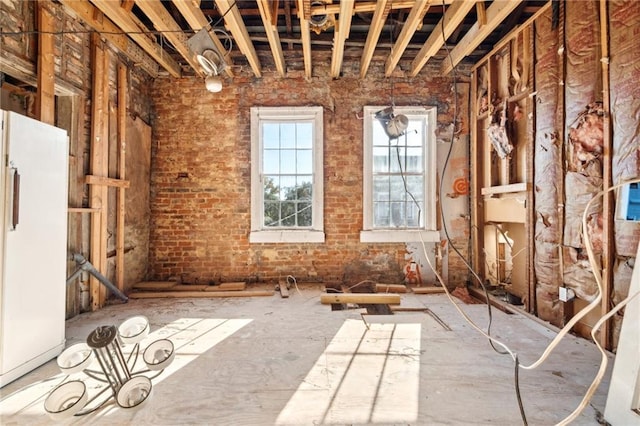 1432 Magazine St, New Orleans, LA 70130 - misc room featuring brick wall