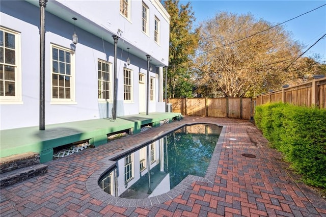 1432 Magazine St, New Orleans, LA 70130 - view of swimming pool with a patio area