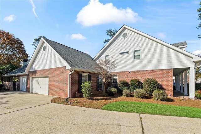 view of property exterior featuring a garage