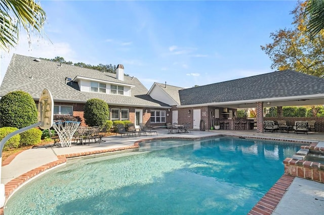 view of pool featuring a patio area