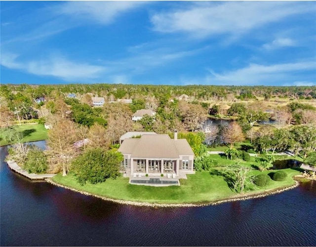 birds eye view of property featuring a water view