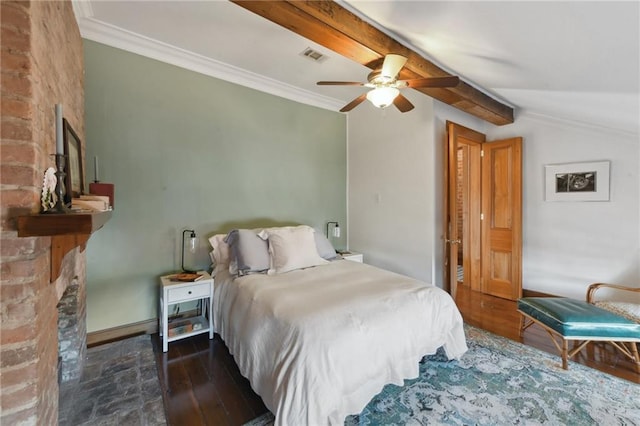 bedroom featuring vaulted ceiling with beams, dark hardwood / wood-style floors, ceiling fan, and ornamental molding