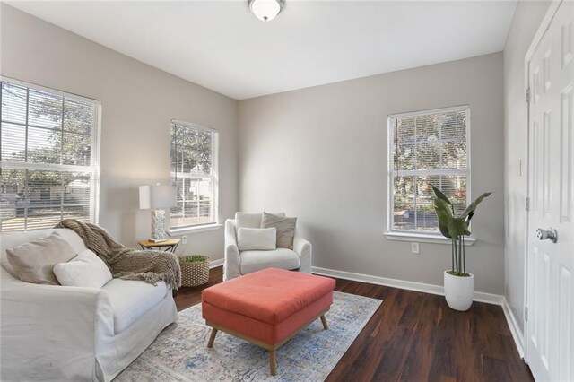 living area featuring dark hardwood / wood-style floors