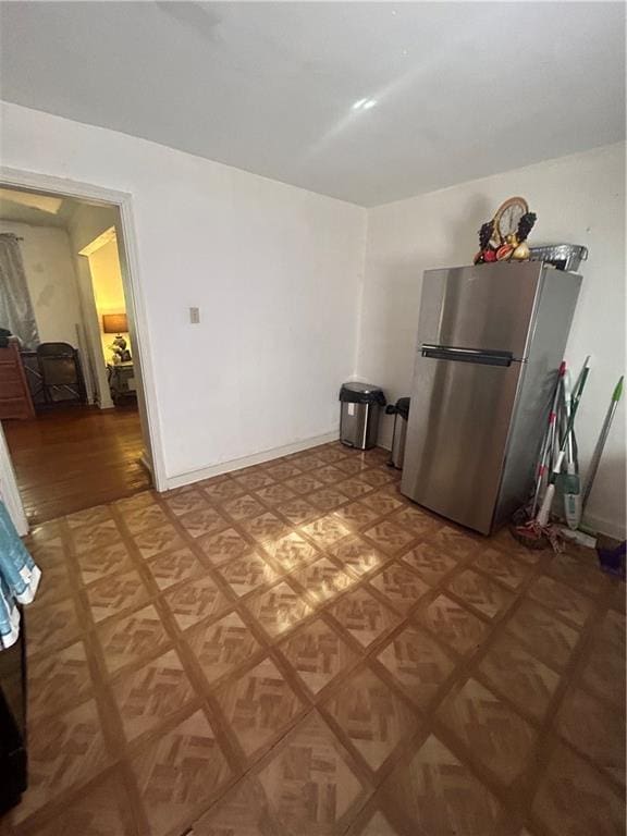 interior space with stainless steel fridge