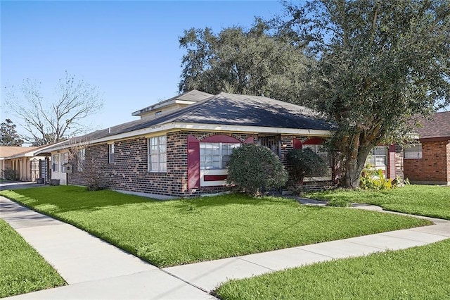 single story home with a front yard