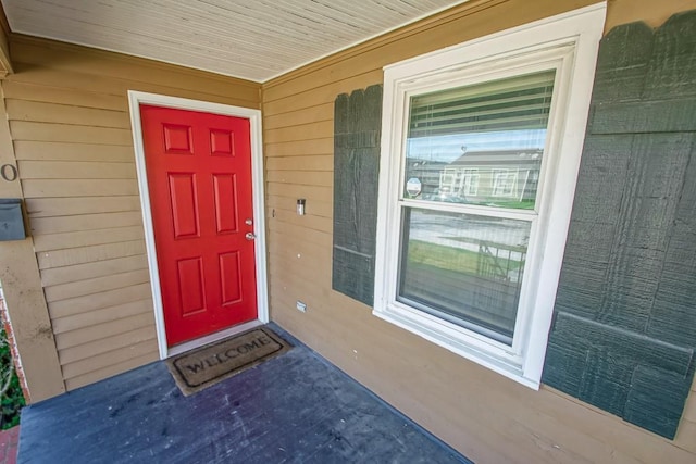 doorway to property with a porch