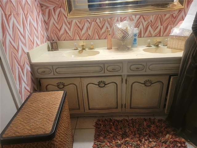 bathroom with tile patterned flooring and vanity