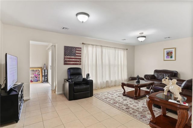 living room with light tile patterned floors