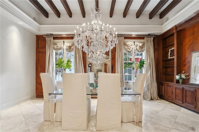 dining room featuring beam ceiling and a chandelier