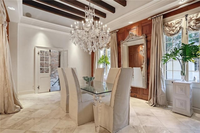 dining space with beamed ceiling, plenty of natural light, ornamental molding, and a notable chandelier