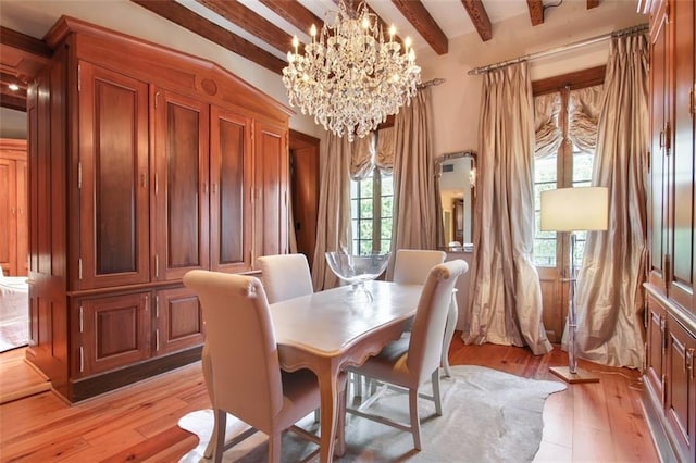 dining space featuring beam ceiling, light wood-type flooring, and a notable chandelier