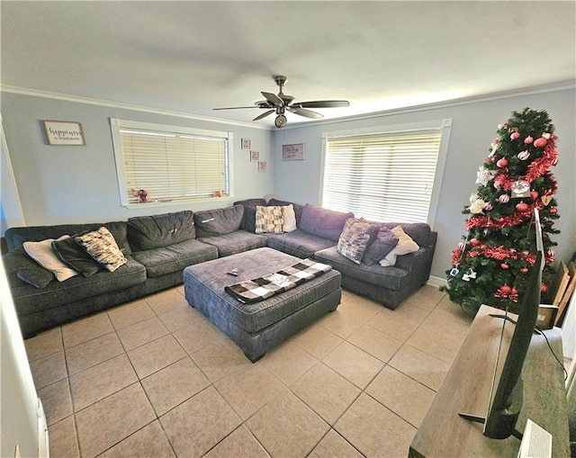 tiled living room featuring ceiling fan and ornamental molding