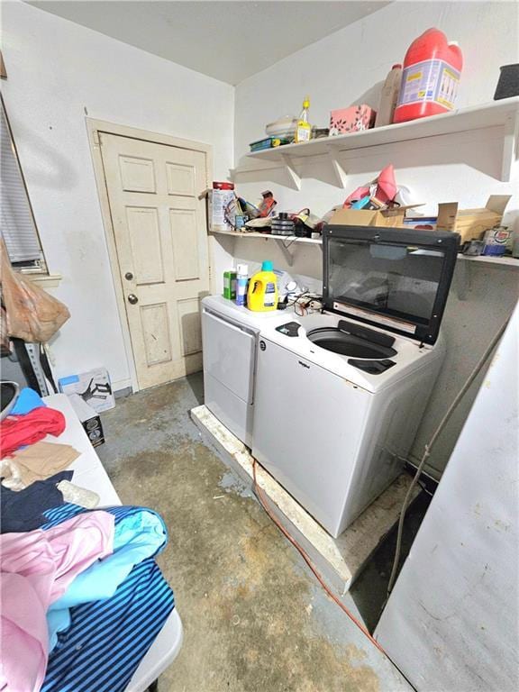 laundry area featuring separate washer and dryer