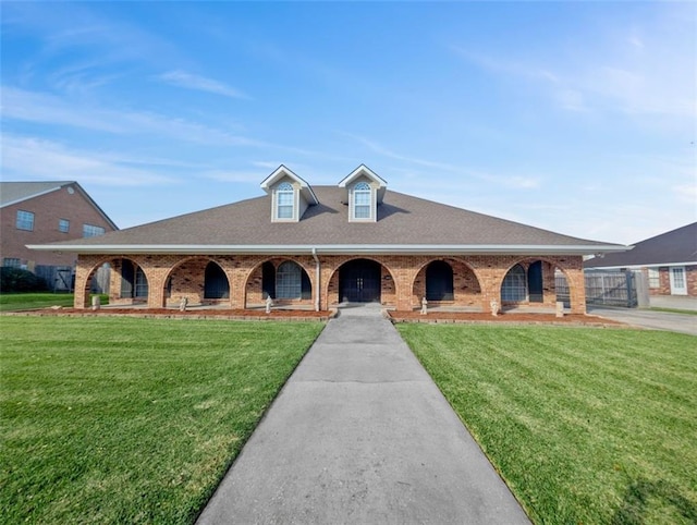 view of front of home with a front lawn