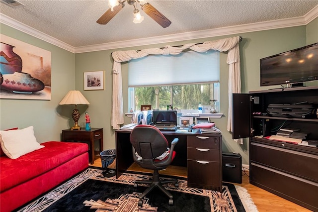 office area with crown molding, ceiling fan, a textured ceiling, and light hardwood / wood-style floors