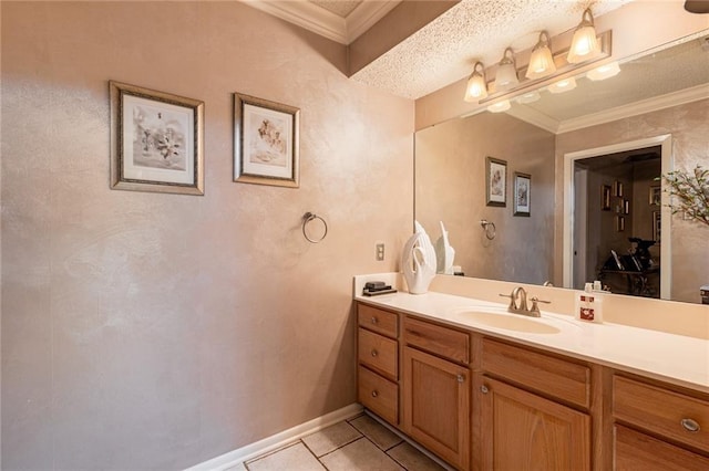 bathroom featuring crown molding, vanity, and tile patterned flooring