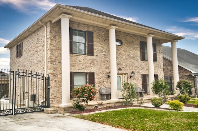 view of front of property featuring covered porch