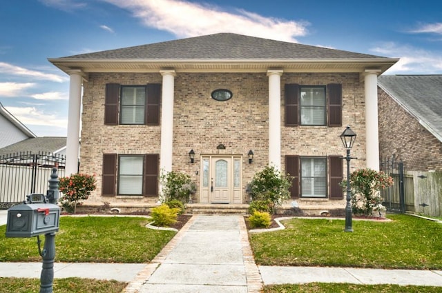 view of front of house with a front yard