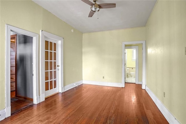 unfurnished room featuring hardwood / wood-style floors and ceiling fan