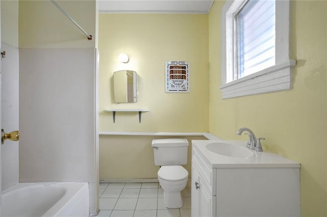 bathroom with tile patterned floors, vanity, and toilet