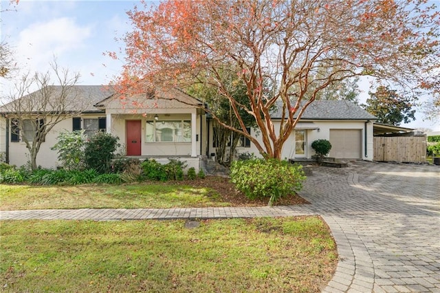 single story home with a carport and a front lawn