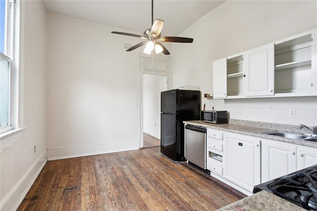 kitchen with dishwasher, white cabinets, black fridge, vaulted ceiling, and ceiling fan