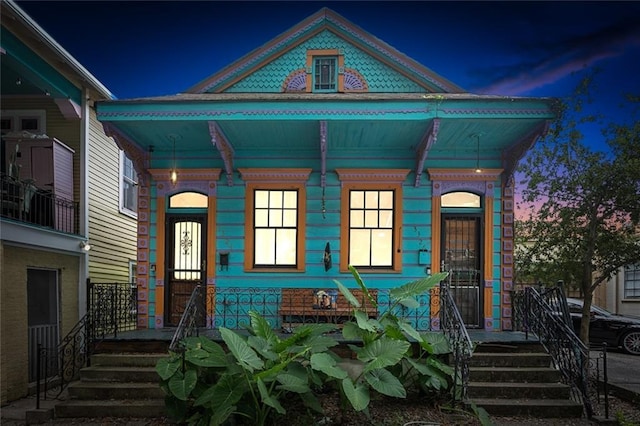 view of front of property featuring covered porch