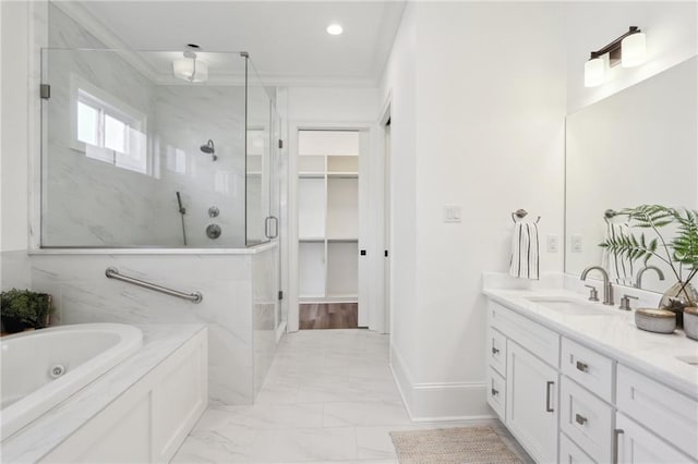 bathroom featuring vanity, crown molding, and independent shower and bath