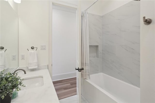 bathroom with vanity and shower / bathtub combination with curtain