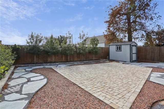 view of patio / terrace featuring a shed