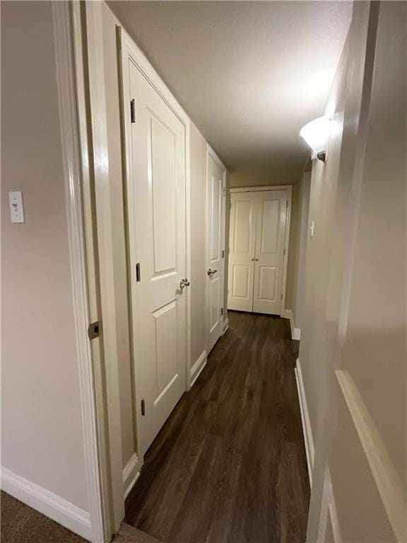 hall featuring dark hardwood / wood-style floors