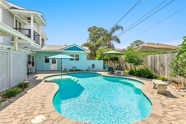 view of pool featuring a patio