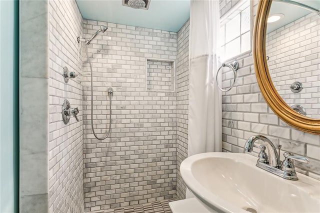 bathroom featuring sink and walk in shower