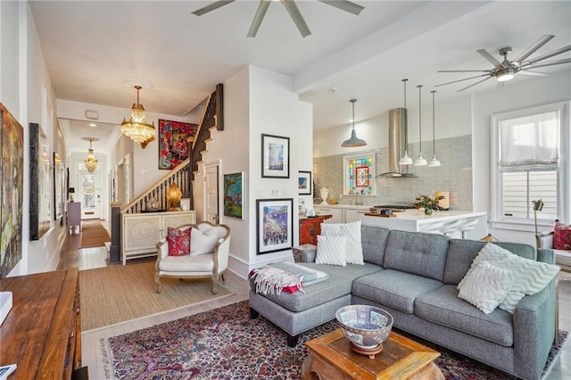 living room featuring hardwood / wood-style floors and a notable chandelier