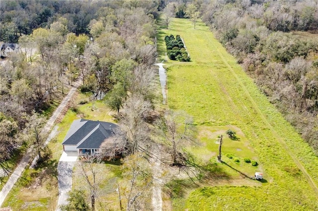 birds eye view of property with a rural view