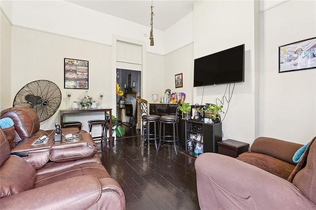 living room featuring dark hardwood / wood-style floors