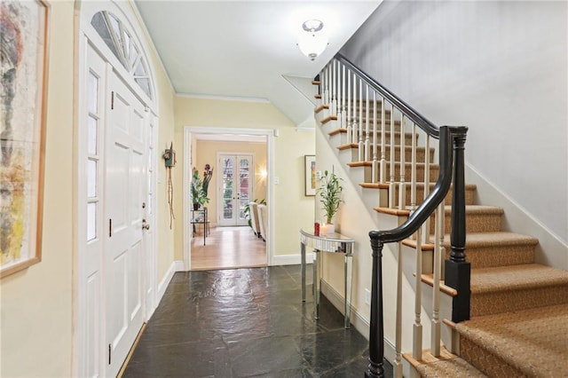 entryway featuring french doors