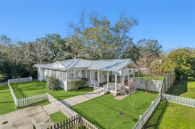 view of front of home with a front lawn and covered porch