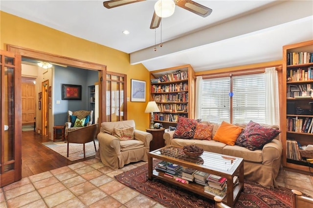 living room with ceiling fan and vaulted ceiling with beams