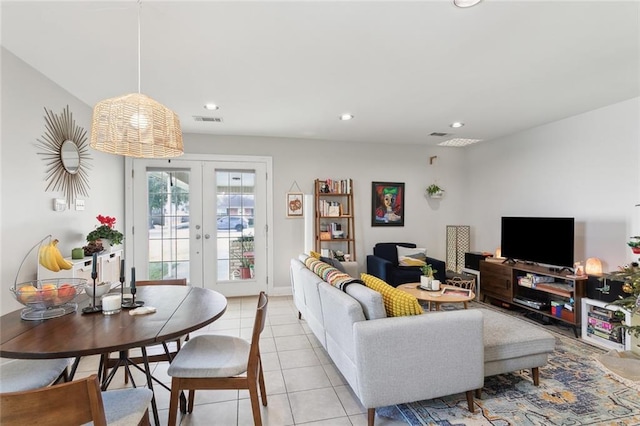 tiled living room featuring french doors