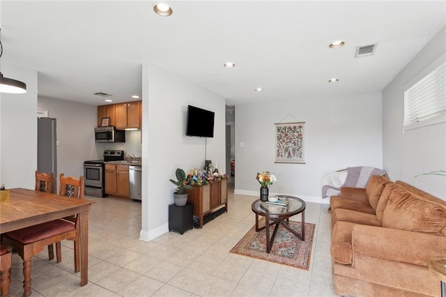 living room featuring sink