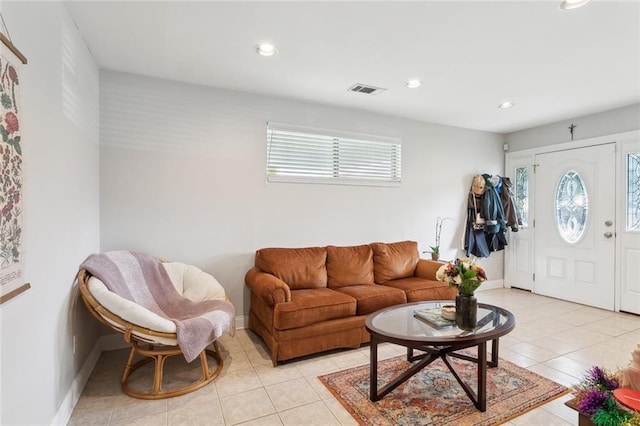 living room with light tile patterned flooring