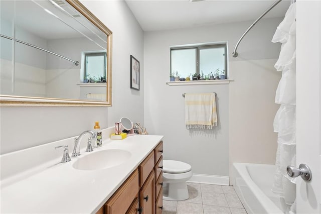 full bathroom with tile patterned flooring, vanity, shower / bath combination, and toilet