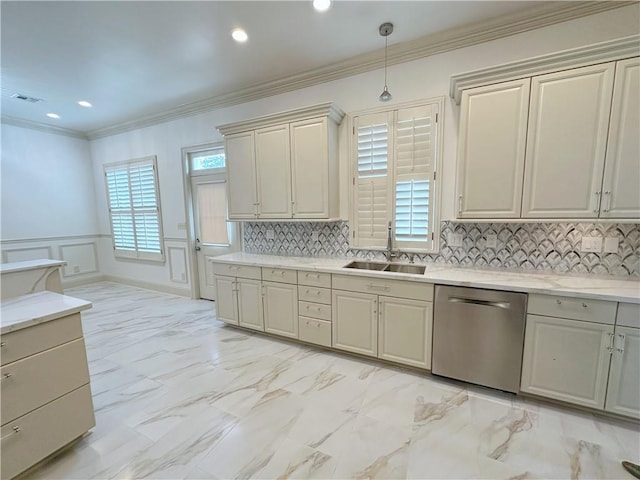 kitchen with dishwasher, sink, crown molding, decorative light fixtures, and decorative backsplash