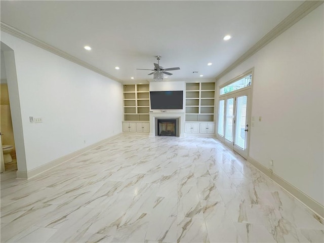 unfurnished living room with built in shelves, french doors, crown molding, and ceiling fan