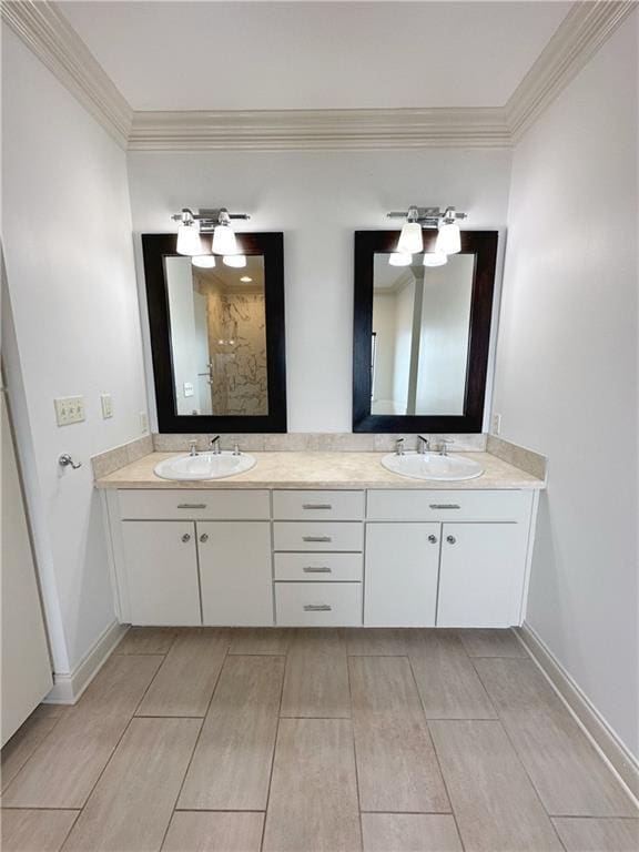 bathroom featuring vanity and ornamental molding