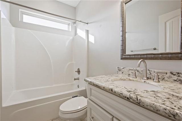 full bathroom featuring vanity, shower / bathtub combination, and toilet