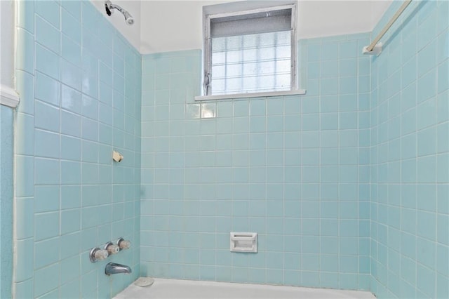 bathroom with shower / bath combination