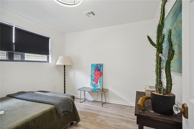 bedroom featuring light wood-type flooring